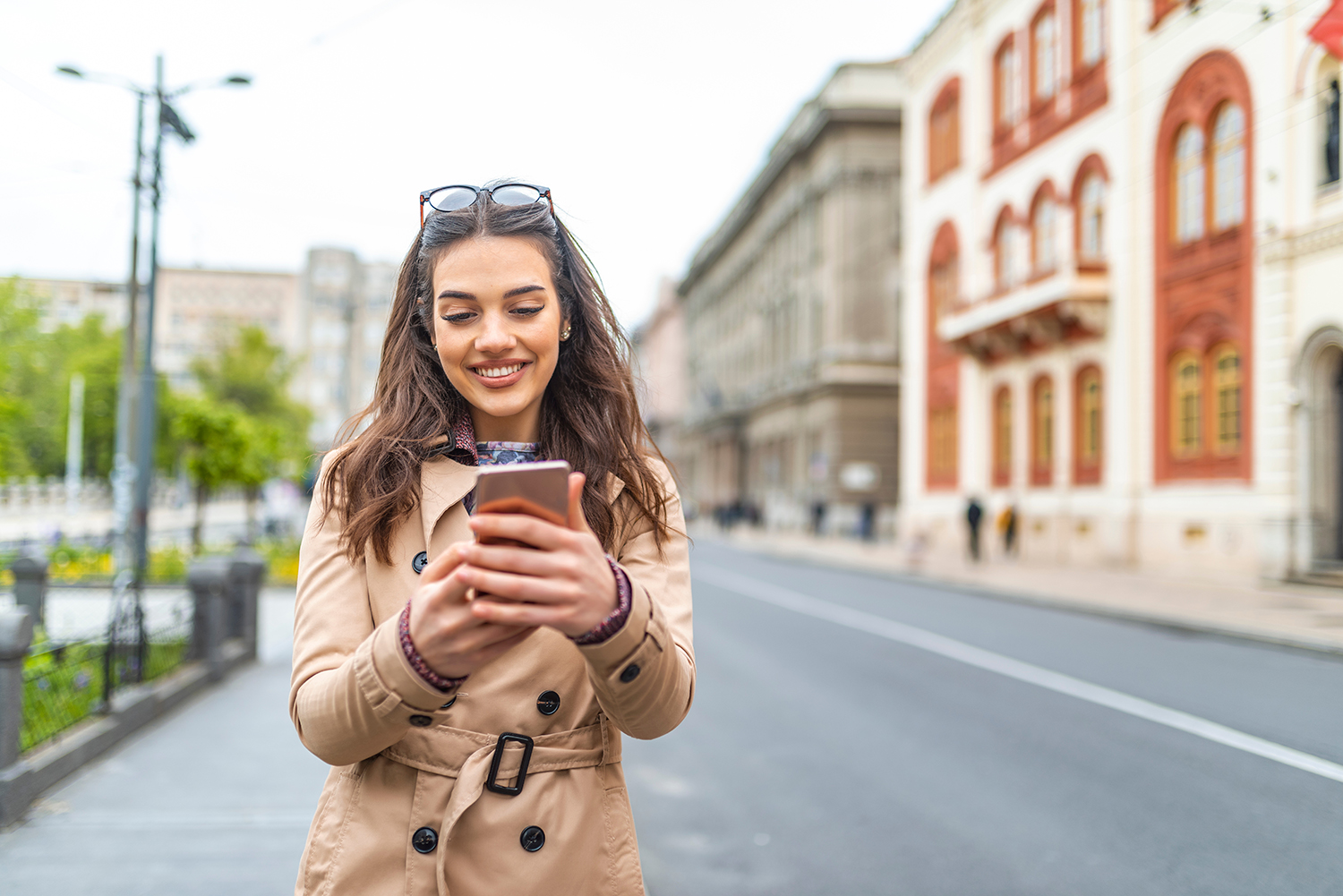 Woman using ROAM in European city