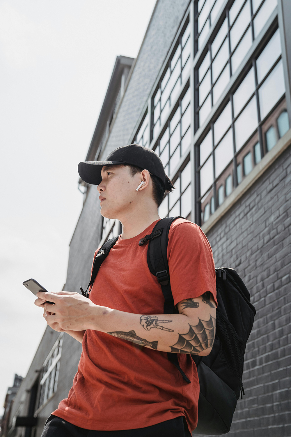 Young explorer with earbuds
